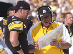 Ben and Bruce Arians confer on the sidelines earlier in the season.