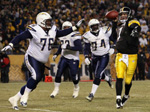 Ben dances away from Ravens defenders last Sunday.