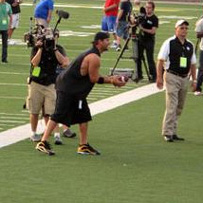 Ben throws footballs into the stands for fans during the taping of Shaq's new reality show. Photo from WPXI.